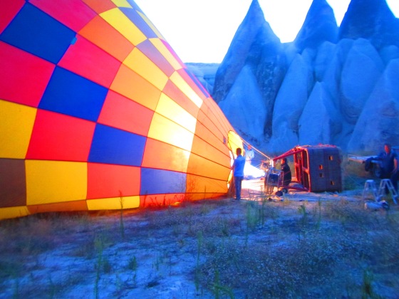 Blowing the balloon up at sunrise
